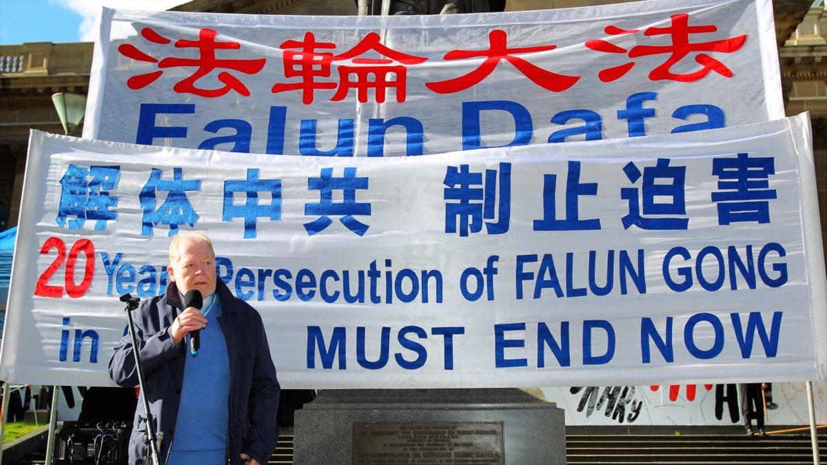 Andrew Bush, former senior member of the Liberal Party and now Vice President of Better Hearing Australia, speaks at a rally in Melbourne, Australia on July 20, 2019. The purpose of the rally was to raise awareness about the 20 years persecution of Falun Gong practitioners occurring in China. (Chen Ming/Epoch Times)