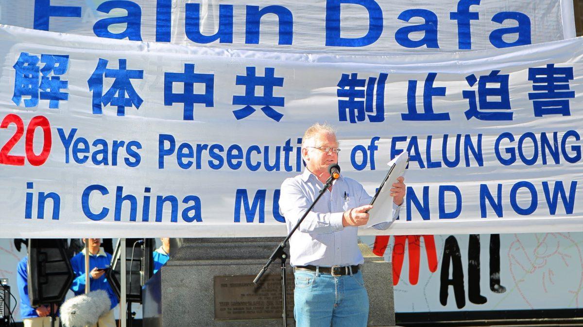 Gerard Flood, from DLP (Democratic Labor Party), speaks at a Melbourne Rally on July 20, 2019. The purpose of the rally was to raise awareness about the 20 years persecution of Falun Gong practitioners occurring in China. (Chen Ming/Epoch Times)