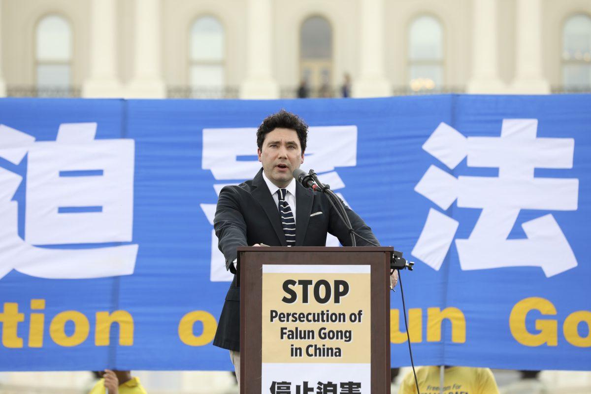 Marion Smith, executive director at Victims of Communism Memorial Foundation, speaks at a rally commemorating the 20th anniversary of the persecution of Falun Gong in China, on the West lawn of Capitol Hill in Washington on July 18, 2019. (Samira Bouaou/The Epoch Times)