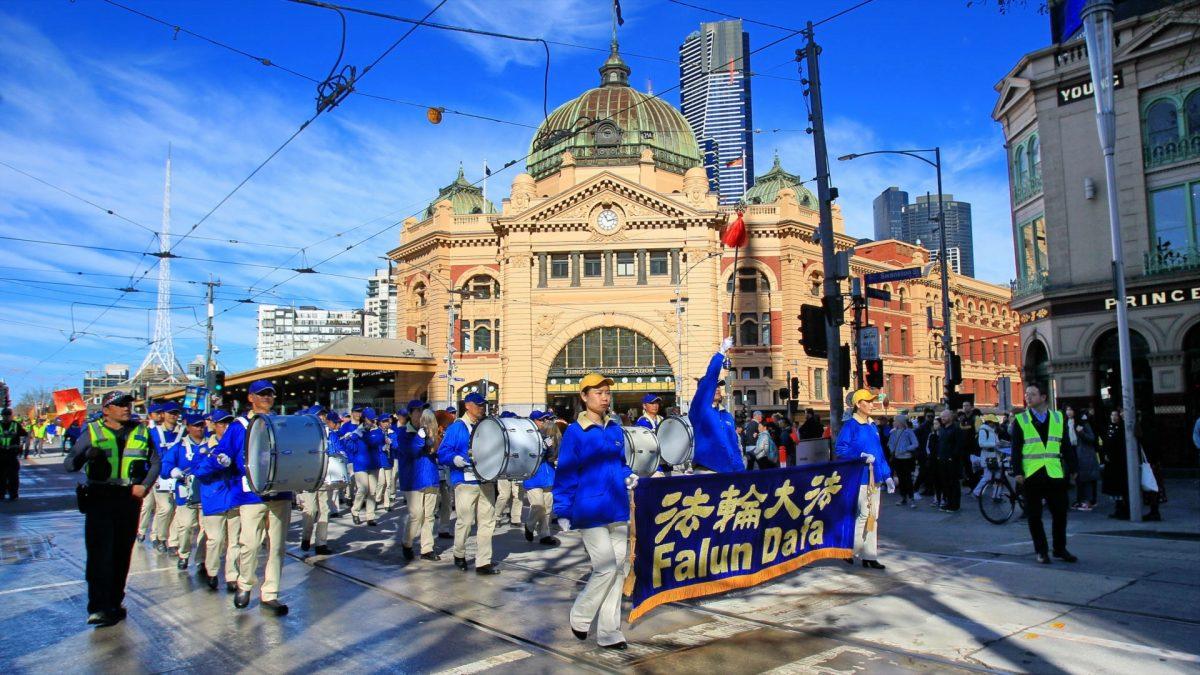 The Tianguo Marching Band leads the Falun Dafa march down Melbourne, Australia on July 20, 2019. The march marks 20 years of persecution that has since seen Falun Dafa practitioners in China experience one of the worst human rights abuses in history, such as organ harvesting. (Chen Ming/Epoch Times)