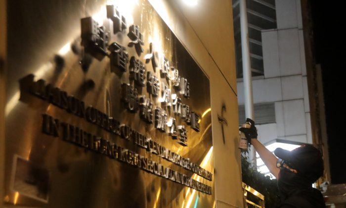In Direct Challenge, Hong Kong Protesters Deface Beijing’s Representative Office