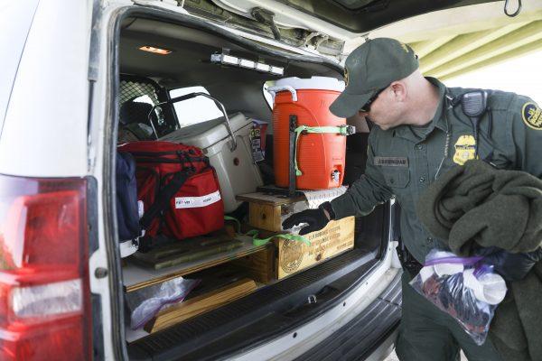 Border Patrol EMT agent J. Birmingham shows his medical gear in the back of his truck after conducting a medical screening on 39 illegal aliens who have just crossed the Rio Grande from Mexico into the United States near McAllen, Texas, on April 18, 2019. (Charlotte Cuthbertson/The Epoch Times)