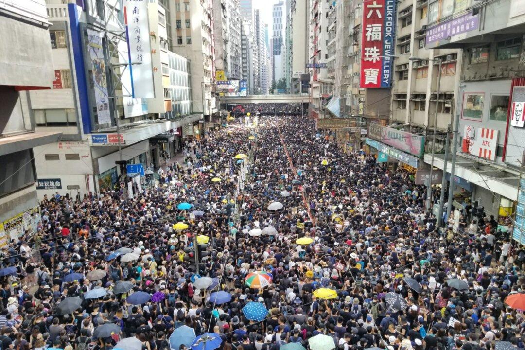 Beijing Responds Angrily as Hongkongers Continue to Protest