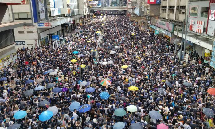 Beijing Responds Angrily as Hongkongers Continue to Protest