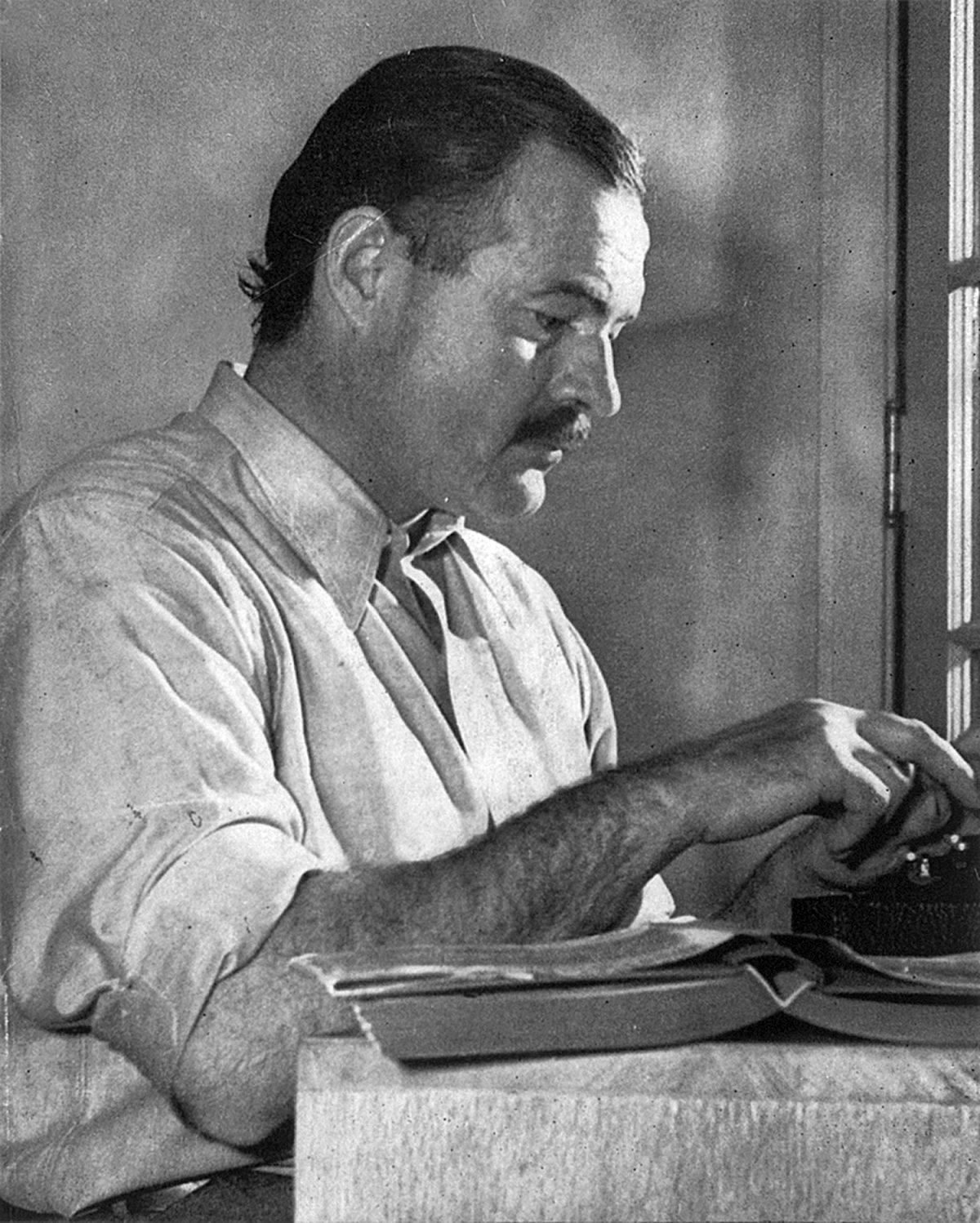 Ernest Hemingway, pictured here in 1939, used some of the rhythms of the King James Bible in his novels and short stories. (Public Domain)