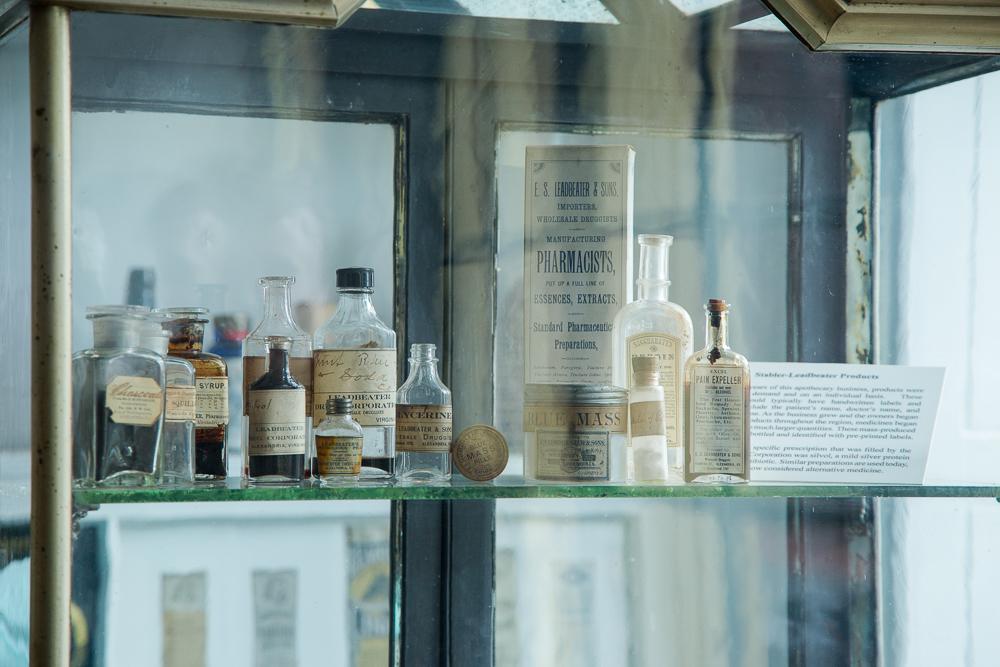 Glass case at the Stabler-Leadbeater Apothecary Museum. (K Summerer for Visit Alexandria)