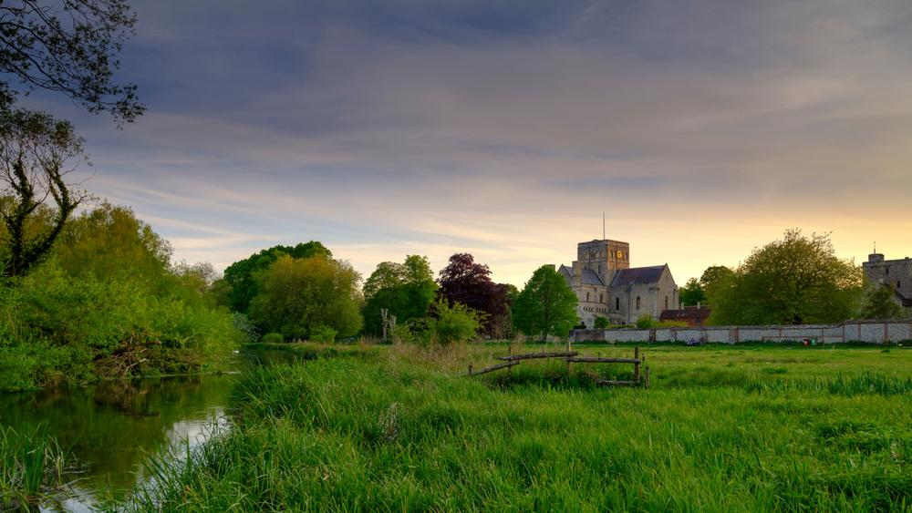 Sunset over St. Cross Hospital and the River Itchen in Winchester. (Shutterstock)