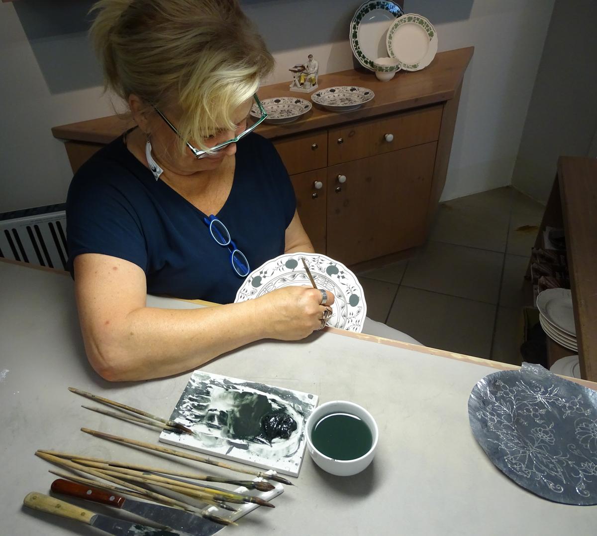 A hand-painting demonstration at the Meissen Porcelain Manufactory. (John M. Smith)