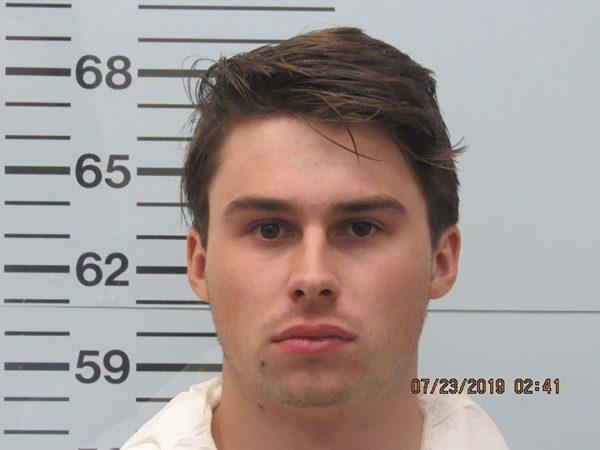 This photo provided by the Lafayette County Sheriff's Department shows Brandon A. Theesfeld, 22, in Oxford, Miss., on July 23, 2019. (Lafayette County Sheriff's Department via AP)