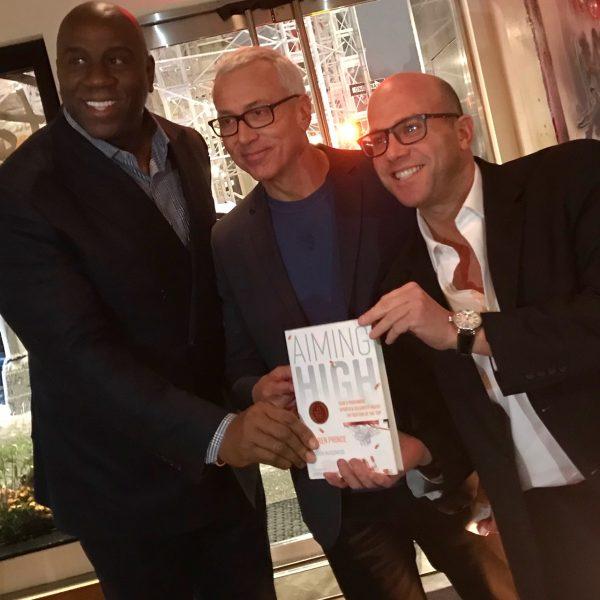 Darren Prince (L) with Magic Johnson during the book release party for Prince's "Aiming High: How a Prominent Sports & Celebrity Agent Hit Bottom at the Top." (Courtesy of Darren Prince)