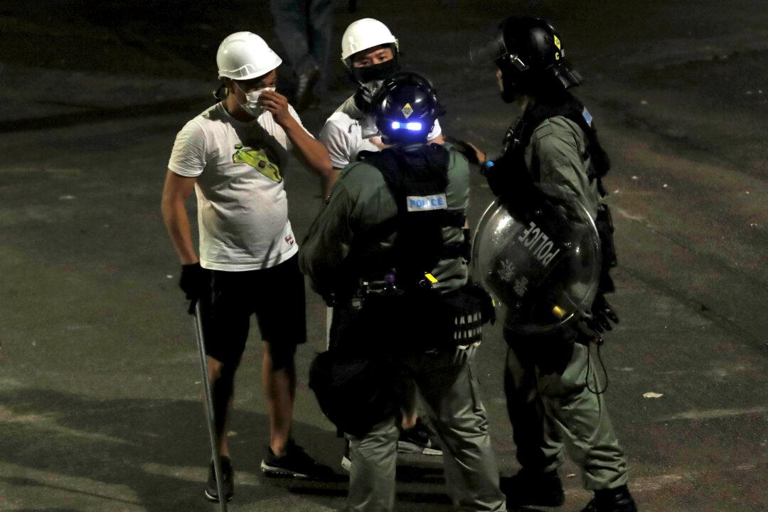 Why Hong Kong’s Chief Executive Didn’t Respond On the Morning After the Mob Attacks