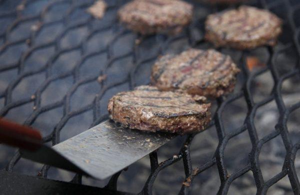Hamburgers on a grill. (Carolyn Kaster/AP Photo)