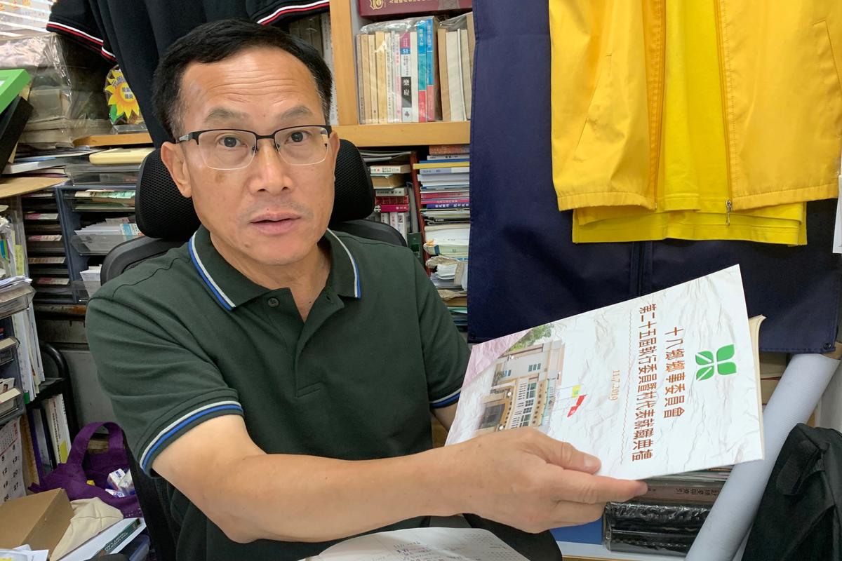 District councillor Johnny Mak Ip-sing, is pictured at his office in Yuen Long, Hong Kong, China on July 23, 2019. (James Pomfret/Reuters)