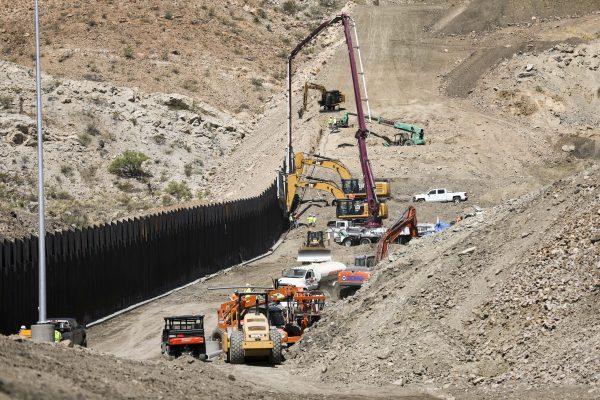 Construction on a new half-mile section of border fence built by We Build the Wall at Sunland Park, N.M., on May 30, 2019. (Charlotte Cuthbertson/The Epoch Times)