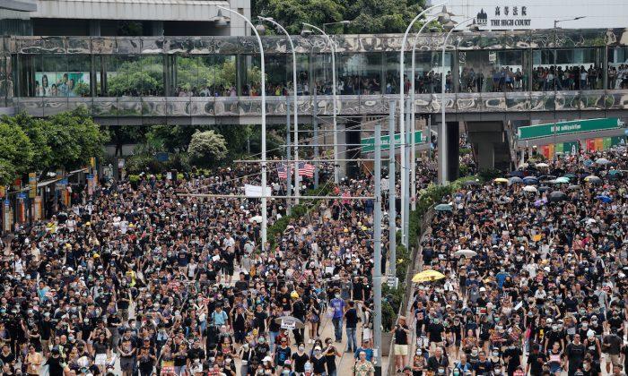 Protesters Mass in Hong Kong Amid Fears of Growing Cycle of Violence