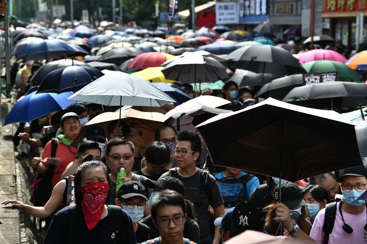 Protesters demonstrate in the district of Yuen Long in Hong Kong on July 27, 2019. (Anthony Wallace/AFP/Getty Images)