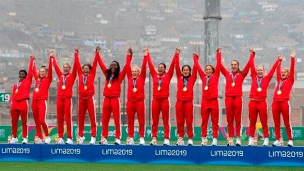 Canada's women's rugby sevens team stand on the podium in Lima, Peru, with their Pan Am gold medals, on July 28, 2019. (Andrew Vaughan/The Canadian Press)