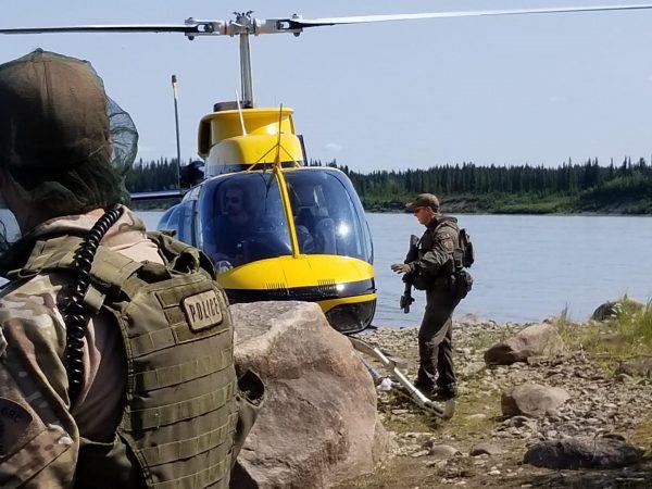 The RCMP search a rural area near Gillam, Manitoba, in hopes of locating the two B.C. murder suspects, on July 30, 2019. (Royal Canadian Mounted Police)