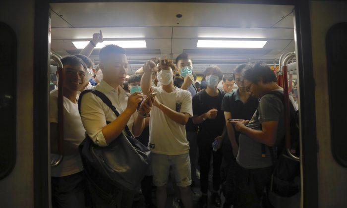 Hong Kong Protesters Interrupt Morning Commute With Demonstrations