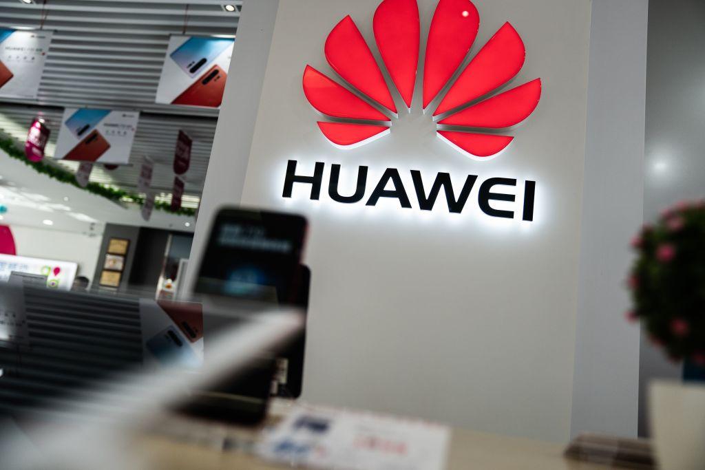 A Huawei logo is displayed at a retail store in Beijing on May 20, 2019. (Fred Dufour/AFP/Getty Images)