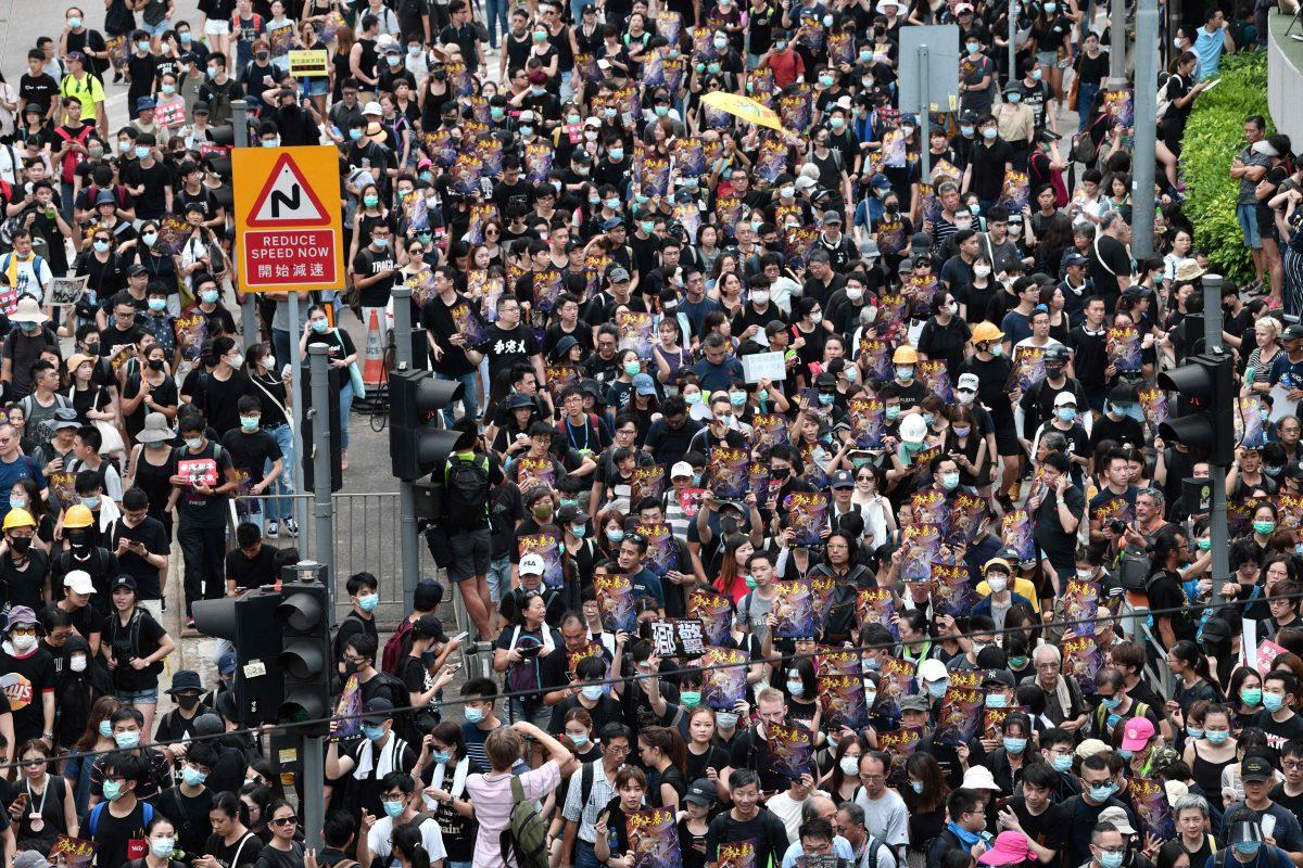Protesters march during a demonstration in Hong Kong on July 28, 2019. (Anthony Wallace/AFP/Getty Images)