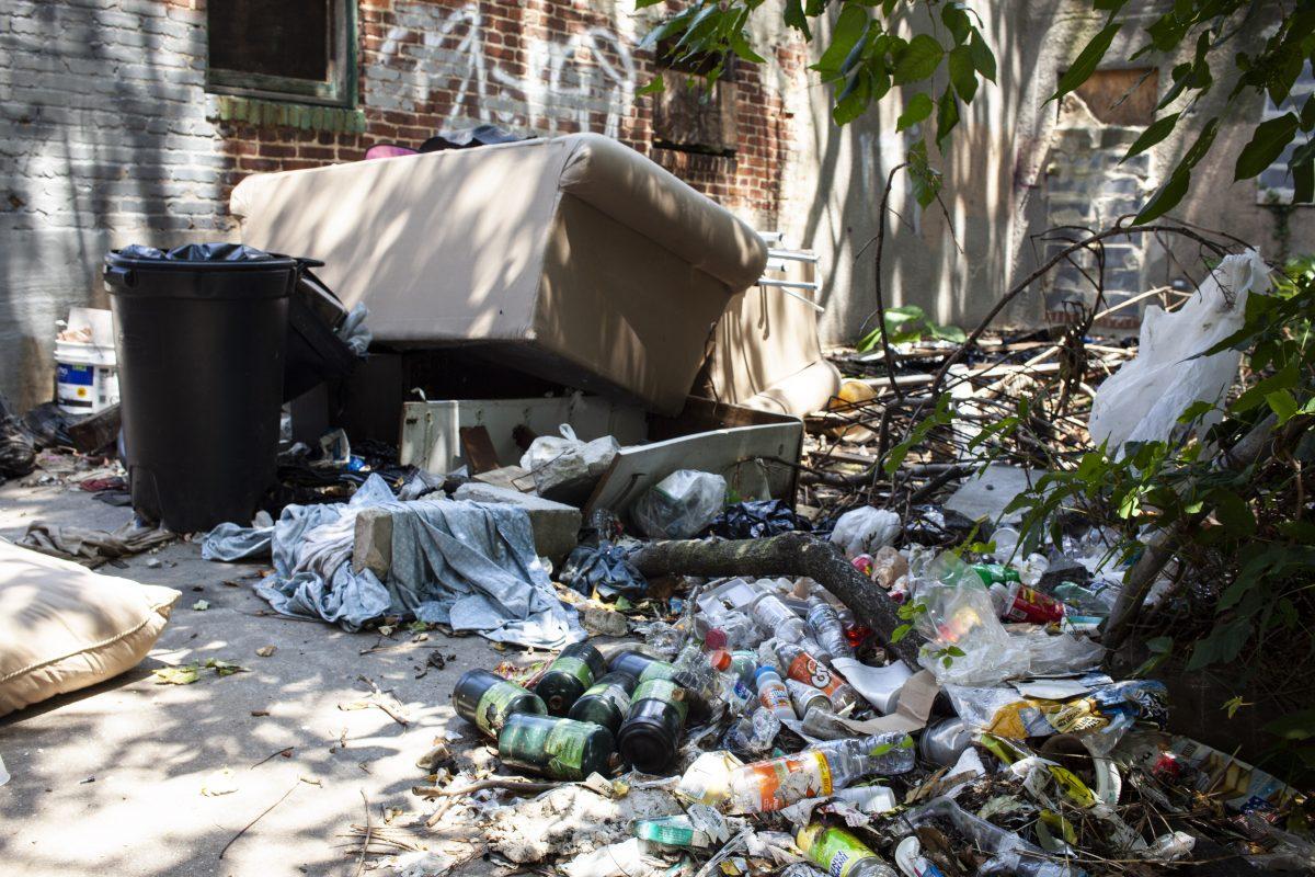 Trash on a street in West Baltimore, Md., on July 30, 2019. (Petr Svab/The Epoch Times)