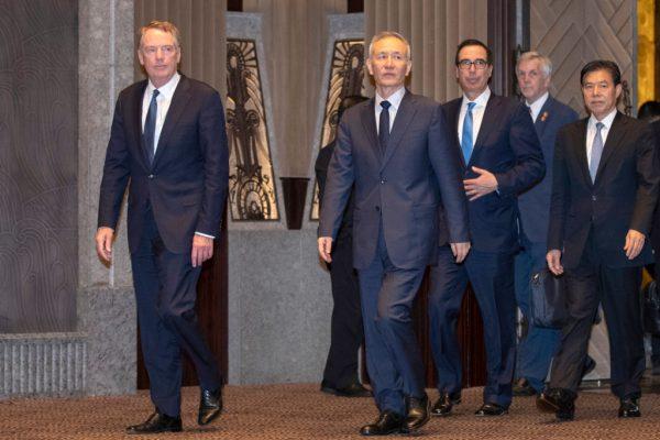 U.S. Trade Representative Robert Lighthizer (L) and U.S. Treasury Secretary Steven Mnuchin (3rd L) walk with Chinese Vice Premier Liu He (2nd L) at the Xijiao Conference Centre in Shanghai, China on July 31, 2019. (Ng Han Guan/AFP/Getty Images)
