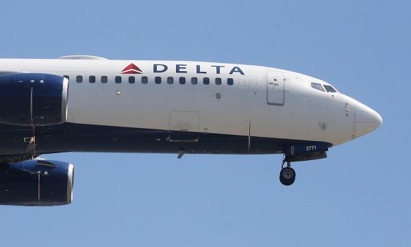 A Delta Air Lines plane lands at Los Angeles International Airport in Los Angeles, Calif., on July 12, 2018. (Mario Tama/Getty Images)