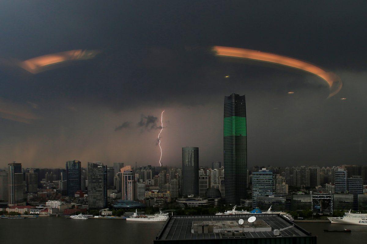 A streak of lightning is seen above the skyline of Shanghai, China on Aug. 19, 2016. (Aly Song/Reuters)