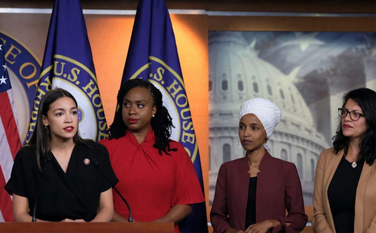 Rep. Alexandria Ocasio-Cortez (D-N.Y.) speaks as Reps. Ayanna Pressley (D-Mass.), Ilhan Omar (D-Minn.), and Rashida Tlaib (D-Mich.) listen during a press conference in Washington on July 15, 2019. (Alex Wroblewski/Getty Images)