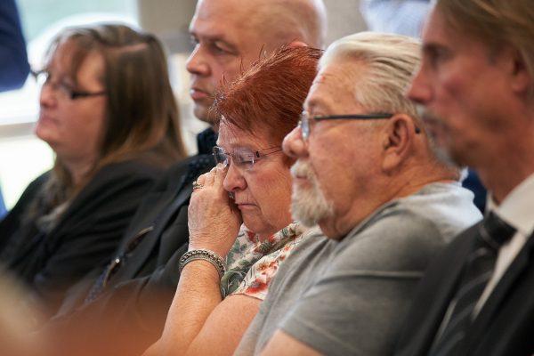 Patricia Houde, daughter-in-law of Helen Matheson, one of the victims of Elizabeth Wettlaufer, wipes away a tear during the presentation of the report of the Public Inquiry into the Safety and Security of Residents in the Long-Term Care Homes System in Woodstock, Ont. on July 31, 2019. (Geoff Robins/The Canadian Press)