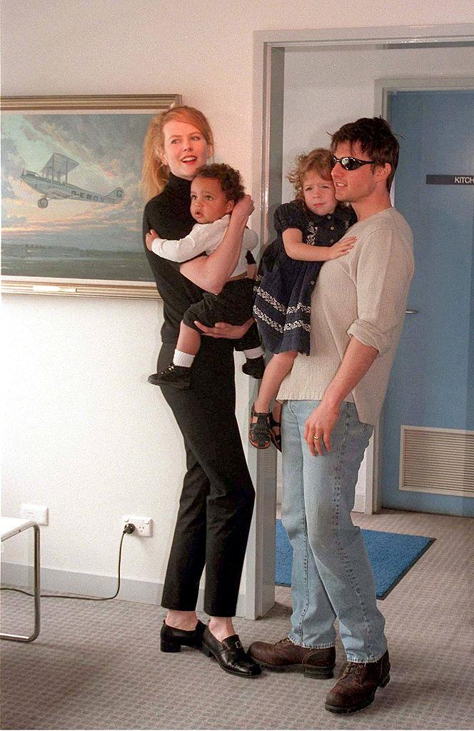Nicole Kidman and husband Tom Cruise arrive at Sydney airport and introduce their children, Connor and Isabella, on Jan. 24, 1996 (©Getty Images | <a href="https://www.gettyimages.ca/detail/news-photo/actors-nicole-kidman-and-husband-tom-cruise-arrive-at-news-photo/51831323">Patrick Riviere</a>)