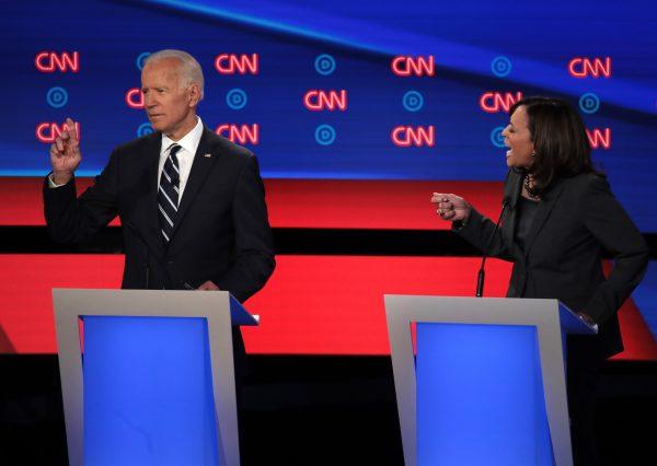Democratic presidential candidate Sen. Kamala Harris (D-Calif.) (R) speaks while former Vice President Joe Biden listens during the Democratic Presidential Debate at the Fox Theatre in Detroit, Michigan, on July 31, 2019. (Scott Olson/Getty Images)