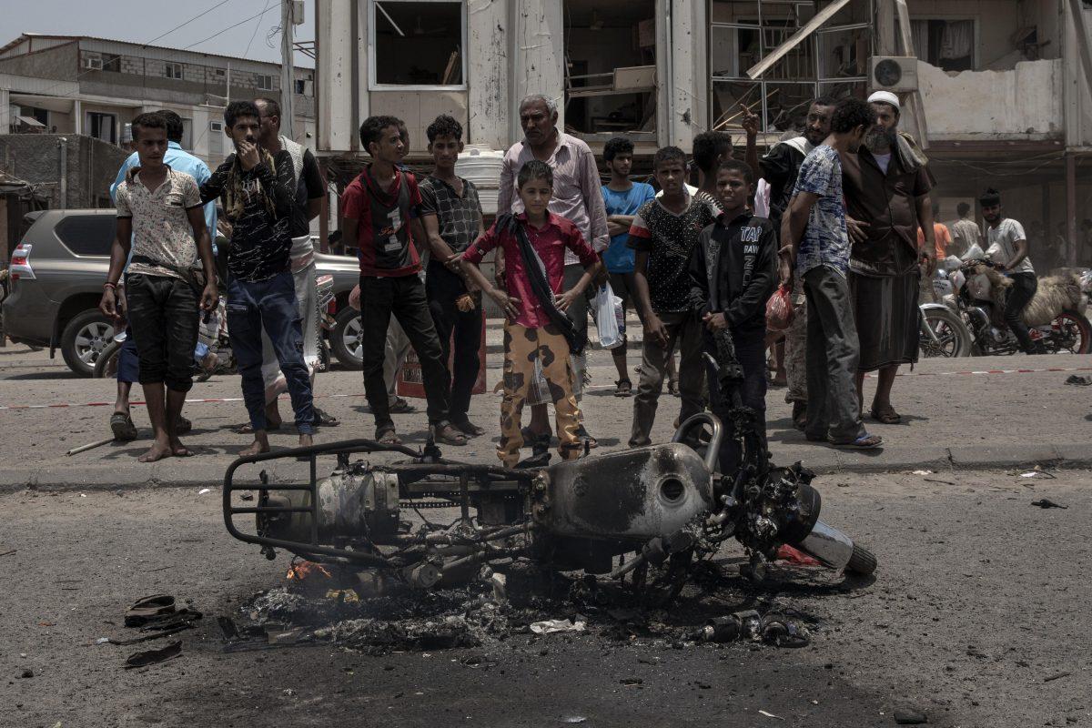 Civilians gather at the site of a deadly attack in Aden, Yemen on Aug. 1, 2019. (Nariman El-Mofty/AP Photo)