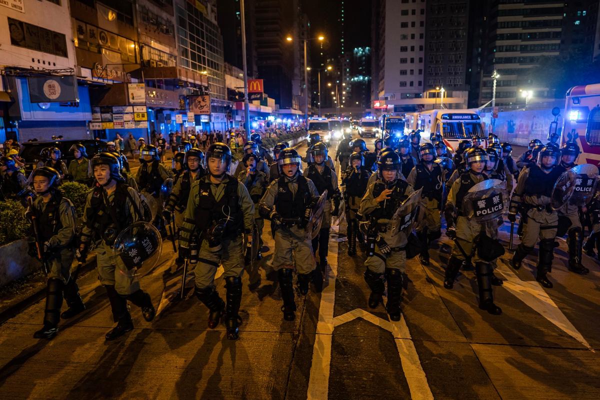 Riot police charge outside of the Mongkok Police Station during a standoff with protesters after a rally in Hong Kong on Sept. 1, 2019. (Anthony Kwan/Getty Images)