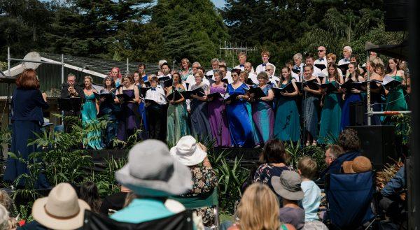 Members of the Opera North chorus sing on stage at Opera in the Garden, on March 9, 2019. (Tracey Morris Photography)