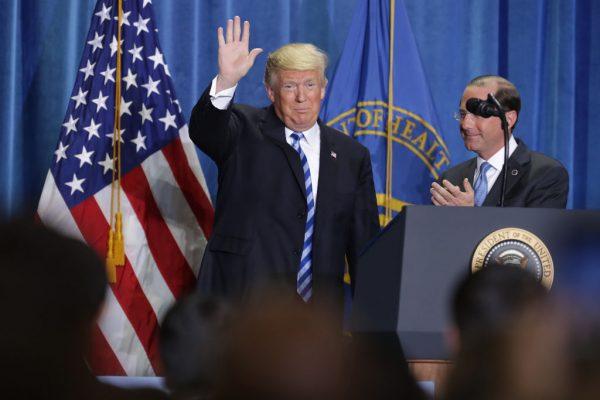 President Donald Trump and Health and Human Services Secretary Alex Azar at HHS headquarters in Washington on Oct. 25, 2018. (Chip Somodevilla/Getty Images)