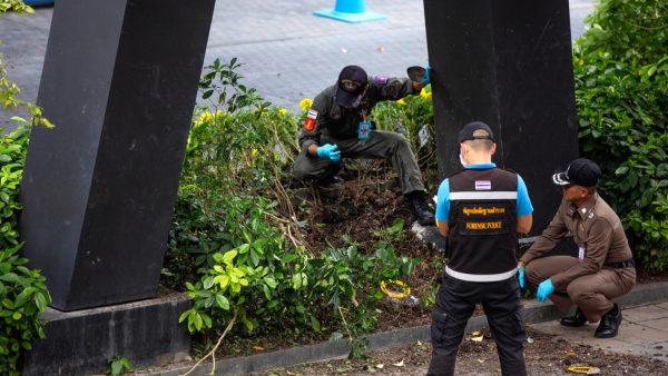 Thai investigators examine a site of an explosion that injured people in Bangkok, Thailand on Aug. 2, 2019. (Gemunu Amarasinghe/Photo AP)