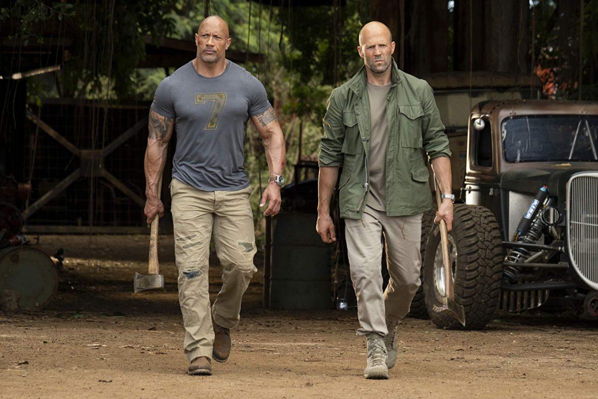 Dwayne Johnson (L), Jason Statham, and a muscle truck in “Fast & Furious Presents: Hobbs & Shaw.” (Daniel Smith/Universal Pictures)