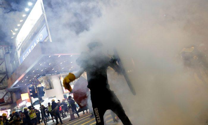 Hong Kong Police Fire Tear Gas as Protests Again Roil the City