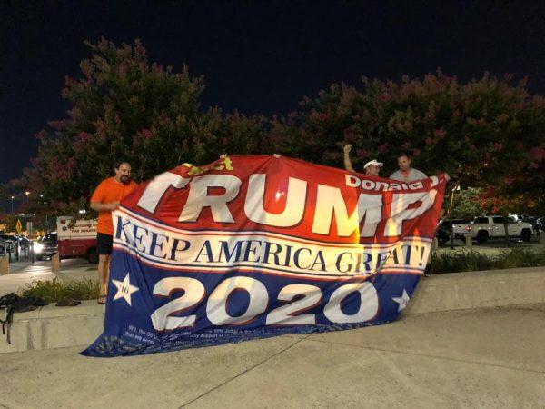 Trump supporters celebrate after a successful mission following their Trump 2020 banner drop at the Baltimore Orioles game at Camden Yards in Baltimore, Md. on Aug. 1, 2019. (Courtesy of Dion Cini)