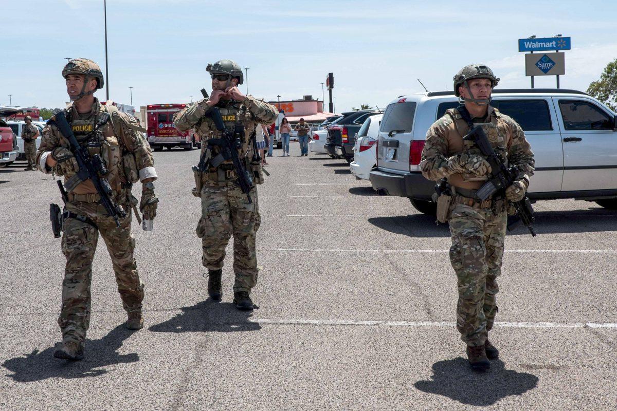 Law enforcement officers responding to an active shooter situation at a Walmart near the Cielo Vista Mall in El Paso, Texas, on Aug. 3, 2019. (Joel Angel Juarez/AFP/Getty Images)