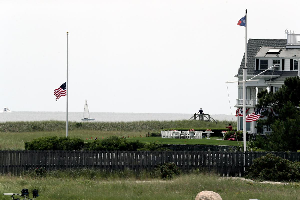 A flag flies at half-staff at the Kennedy compound on Aug. 2, 2019, in Hyannis Port, Mass., a day after Saoirse Kennedy Hill died there at age 22. (Charles Krupa/AP Photo)