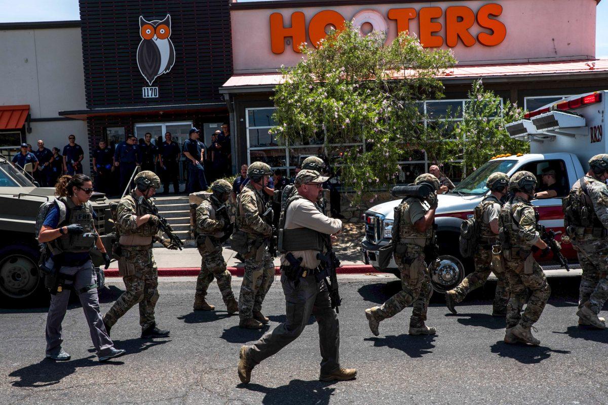Law enforcement officers respond to an active shooter situation at a Walmart near Cielo Vista Mall in El Paso, Texas on Aug. 3, 2019. (Joel Angel Juarez/AFP/Getty Images)