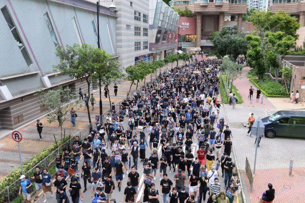 Protesters participate in a march against a controversial extradition bill in Mong Kok, Hong Kong, on Aug. 3, 2019. (Song Bilong/The Epoch Times)