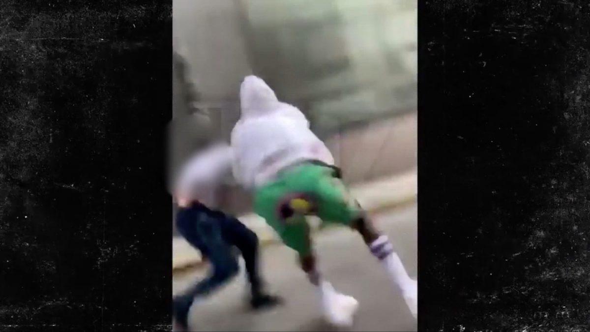 U.S. rapper A$AP Rockey (R) gets in a street fight in Stockholm, Sweden, on June 30, 2019.(Screenshot via CNN)