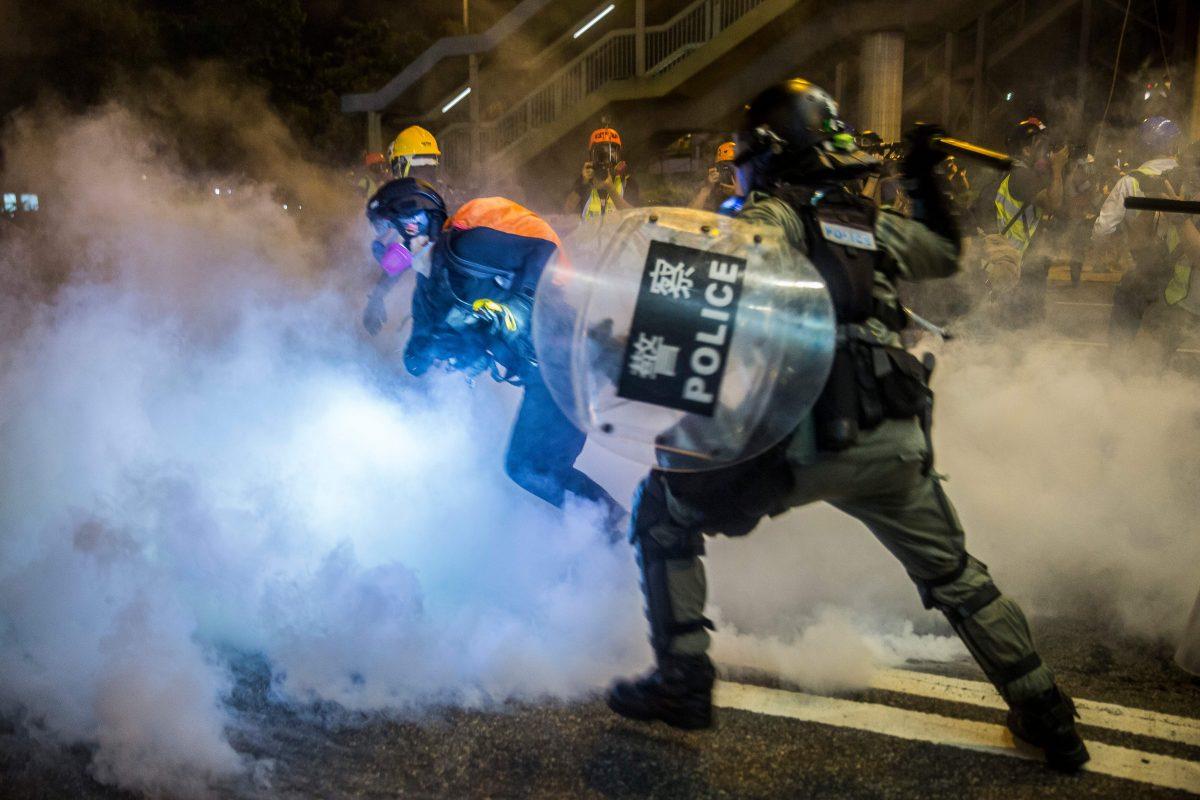Police fire tear gas during a protest in the district of Causeway Bay in Hong Kong on Aug. 4, 2019. (Isaac Lawrence/AFP/Getty Images)