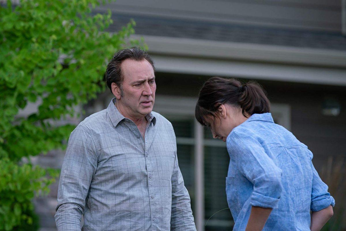 Nicolas Cage and Karolina Wydra in “A Score to Settle.” (RLJE Films)