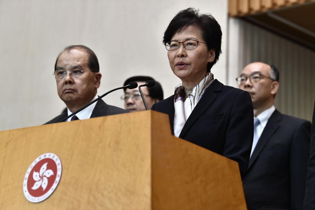 Hong Kong Chief Executive Carrie Lam (C) speaks during a press conference before planned strikes in Hong Kong on Aug. 5, 2019. (Anthony Wallace/AFP/Getty Images)