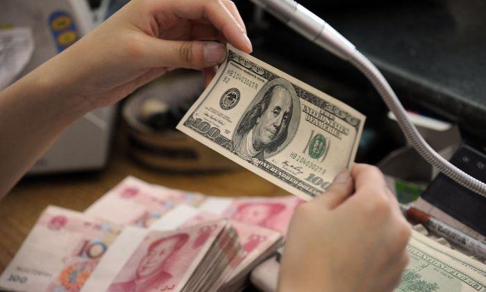 Yuan-to-Dollar Rate Breaks Key Benchmark, Escalating Trade War